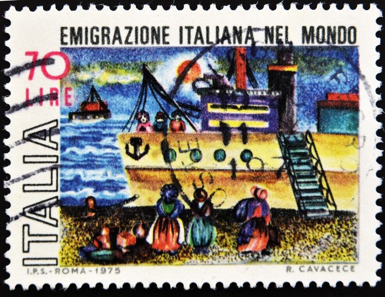 Italian stamp which refers to the Italian emigration in the world, circa 1975